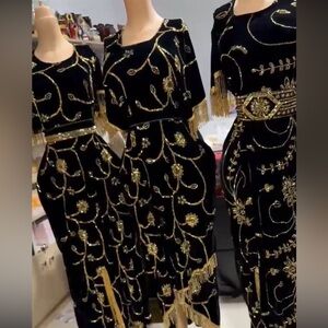 Elegant Black and Gold Embellished Dress